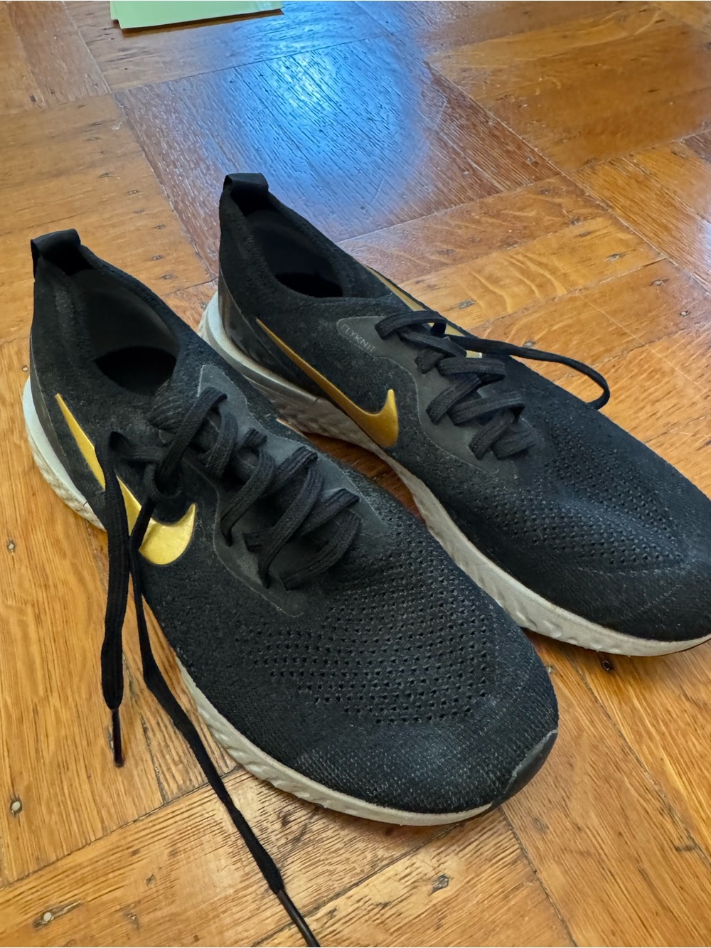 Nike Women’s Black and Gold Athletic Running Shoes